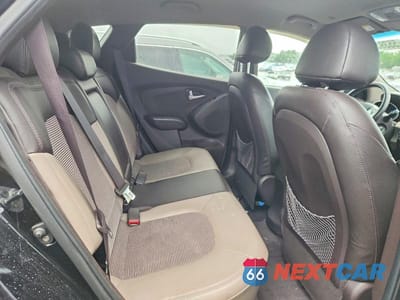 Zdjęcie 11 z 13 samochodu: 2013 HYUNDAI TUCSON GLS VIN:KM8JUCAC3DU680067 - miniatura