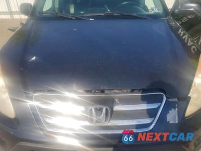 Zdjęcie 12 z 14 samochodu: 2005 HONDA CR-V SE VIN:JHLRD789X5C004766 - miniatura
