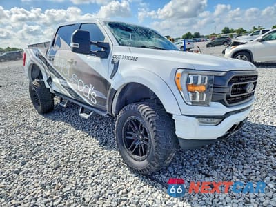 Czwarte zdjęcie samochodu z boku: 2022 FORD F150 SUPERCREW VIN:1FTFW1E55NFA20221 - miniatura
