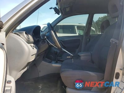 Zdjęcie 7 z 13 samochodu: 2001 TOYOTA RAV4 BASE VIN:JTEHH20V110050180 - miniatura