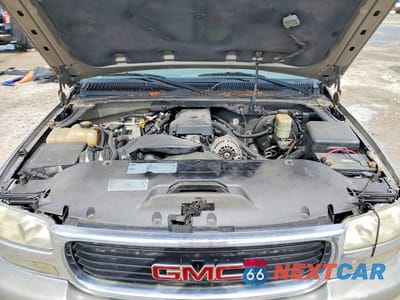 Zdjęcie 12 z 13 samochodu: 2000 GMC YUKON XL VIN:3GKEC16T1YG166026 - miniatura