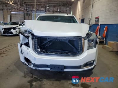 Piąte zdjęcie samochodu w środku: 2015 GMC YUKON XL K1500 SLT VIN:1GKS2HKC9FR127394 - miniatura