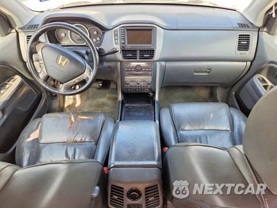 Zdjęcie 8 z 14 samochodu: 2006 HONDA PILOT EX VIN:2HKYF18726H528580 - miniatura