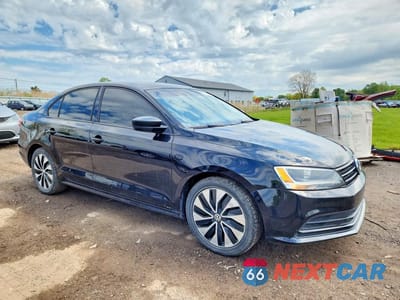 Czwarte zdjęcie samochodu z boku: 2015 VOLKSWAGEN JETTA TDI VIN:3VWLA7AJ7FM328335 - miniatura