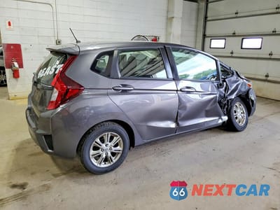Trzecie zdjęcie samochodu z tyłu: 2016 HONDA FIT LX VIN:JHMGK5H52GX041039 - miniatura