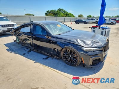 Czwarte zdjęcie samochodu z boku: 2022 BMW 750 XI VIN:WBA7U2C09NCK79994 - miniatura