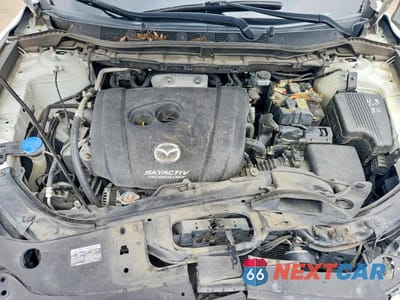 Zdjęcie 12 z 13 samochodu: 2016 MAZDA CX-5 TOURING VIN:JM3KE2CY9G0660711 - miniatura