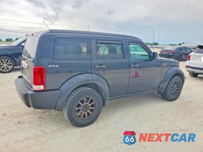 Trzecie zdjęcie samochodu z tyłu: 2010 DODGE NITRO SXT VIN:1D4PU5GK6AW108860 - miniatura