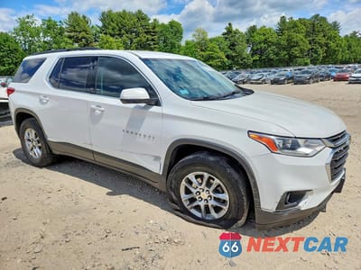 Czwarte zdjęcie samochodu z boku: 2019 CHEVROLET TRAVERSE LT VIN:1GNEVGKW6KJ248372 - miniatura