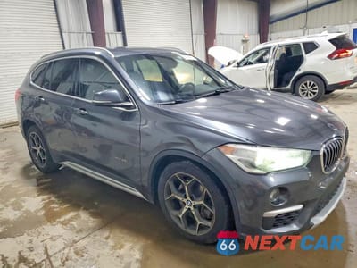 Czwarte zdjęcie samochodu z boku: 2018 BMW X1 XDRIVE28I VIN:WBXHT3C32J5K30941 - miniatura