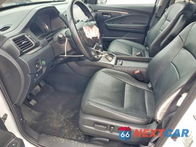 Zdjęcie 7 z 13 samochodu: 2021 HONDA PILOT SE VIN:5FNYF5H27MB008253 - miniatura