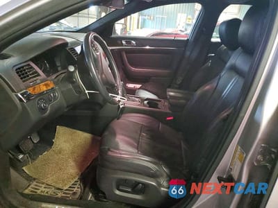 Zdjęcie 7 z 12 samochodu: 2014 LINCOLN MKS VIN:1LNHL9EK4EG600295 - miniatura