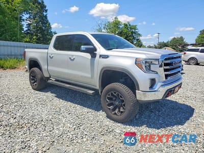 Czwarte zdjęcie samochodu z boku: 2020 GMC SIERRA K1500 SLE VIN:1GTU9BED0LZ347097 - miniatura
