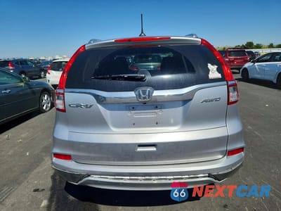 Zdjęcie 6 z 13 samochodu: 2016 HONDA CR-V EXL VIN:2HKRM4H71GH703298 - miniatura