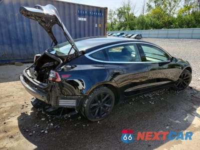 Trzecie zdjęcie samochodu z tyłu: 2019 TESLA MODEL 3 VIN:5YJ3E1EA2KF189972 - miniatura