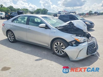 Czwarte zdjęcie samochodu z boku: 2016 TOYOTA CAMRY HYBRID XLE VIN:4T1BD1FK9GU198278 - miniatura