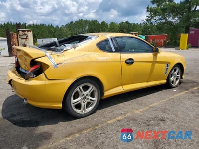 Trzecie zdjęcie samochodu z tyłu: 2005 HYUNDAI TIBURON GT VIN:KMHHN65F75U175216 - miniatura
