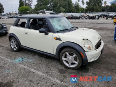 Czwarte zdjęcie samochodu z boku: 2007 MINI COOPER VIN:WMWMF33567TT56502 - miniatura