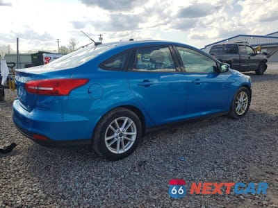 Trzecie zdjęcie samochodu z tyłu: 2017 FORD FOCUS SE VIN:1FADP3F26HL250818 - miniatura