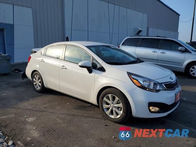 Czwarte zdjęcie samochodu z boku: 2015 KIA RIO EX VIN:KNADN4A3XF6460000 - miniatura