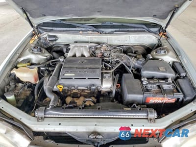 Zdjęcie 11 z 12 samochodu: 1994 TOYOTA CAMRY XLE VIN:JT2GK13E0R0020339 - miniatura