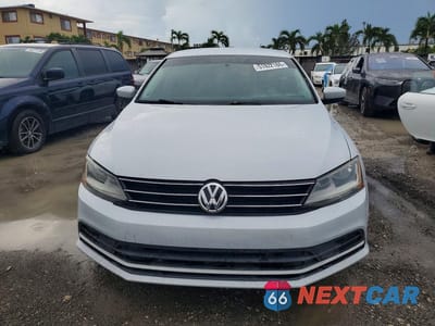 Piąte zdjęcie samochodu w środku: 2017 VOLKSWAGEN JETTA S VIN:3VW2B7AJXHM274640 - miniatura