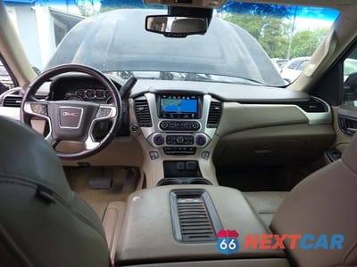 Zdjęcie 9 z 12 samochodu: 2016 GMC YUKON SLT VIN:1GKS2BKC7GR481011 - miniatura