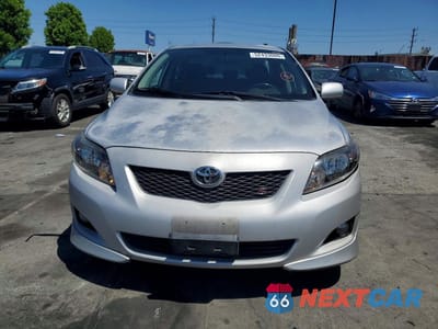 Piąte zdjęcie samochodu w środku: 2009 TOYOTA COROLLA S VIN:1NXBU40E79Z159048 - miniatura