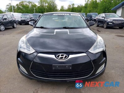 Piąte zdjęcie samochodu w środku: 2013 HYUNDAI VELOSTER BASE VIN:KMHTC6AD3DU099190 - miniatura