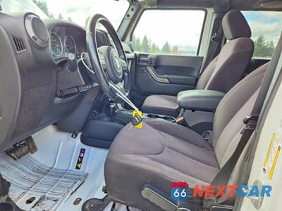 Zdjęcie 7 z 12 samochodu: 2014 JEEP WRANGLER UNLIMITED SPORT VIN:1C4BJWDG5EL145797 - miniatura