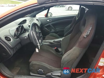 Zdjęcie 7 z 12 samochodu: 2009 MITSUBISHI ECLIPSE SPYDER GS VIN:4A3AL25F19E040086 - miniatura