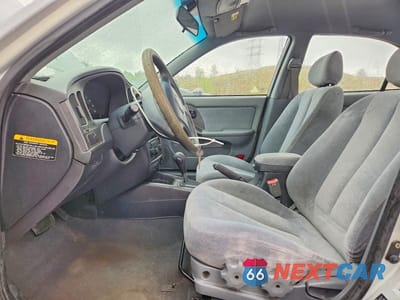 Zdjęcie 7 z 12 samochodu: 2004 HYUNDAI ELANTRA GLS VIN:KMHDN46D34U712470 - miniatura
