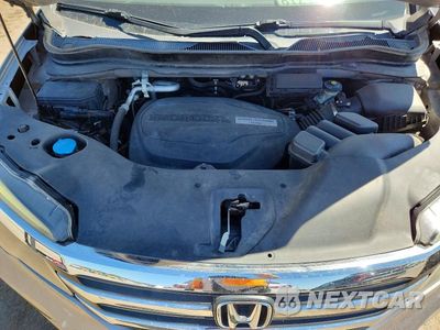 Zdjęcie 12 z 13 samochodu: 2016 HONDA PILOT EXL VIN:5FNYF5H54GB050863 - miniatura
