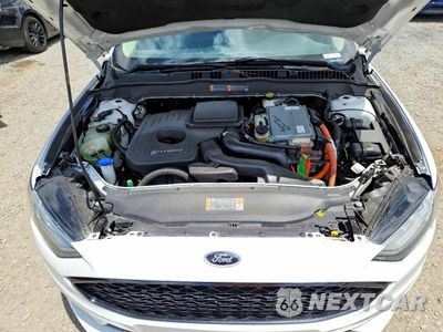 Zdjęcie 11 z 12 samochodu: 2017 FORD FUSION SE HYBRID VIN:3FA6P0LU8HR386625 - miniatura