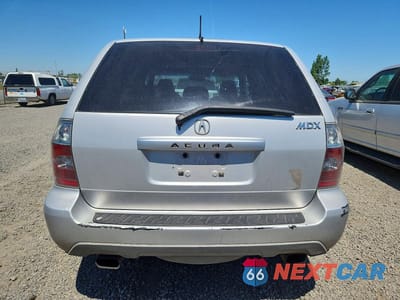 Zdjęcie 6 z 13 samochodu: 2004 ACURA MDX TOURING VIN:2HNYD18664H546075 - miniatura