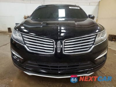 Piąte zdjęcie samochodu w środku: 2018 LINCOLN MKC SELECT VIN:5LMCJ2C90JUL00589 - miniatura