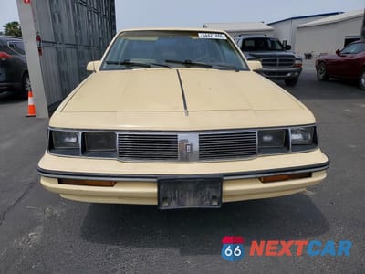 Piąte zdjęcie samochodu w środku: 1987 OLDSMOBILE CUTLASS CIERA S VIN:1G3AJ11W1HD310155 - miniatura