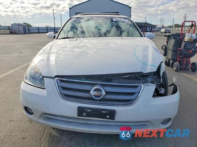 Piąte zdjęcie samochodu w środku: 2002 NISSAN ALTIMA 2.5 VIN:1N4AL11D32C147133 - miniatura
