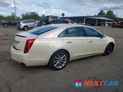 Trzecie zdjęcie samochodu z tyłu: 2013 CADILLAC XTS PREMIUM COLLECTION VIN:2G61T5S32D9103550 - miniatura