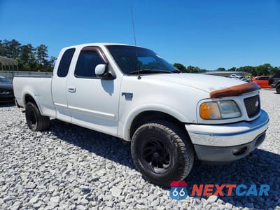 Czwarte zdjęcie samochodu z boku: 2000 FORD F-150 VIN:2FTRX18L2YCB02783 - miniatura