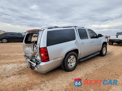 Trzecie zdjęcie samochodu z tyłu: 2012 CHEVROLET SUBURBAN C1500 LT VIN:1GNSCJE05CR236410 - miniatura