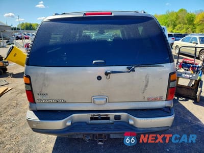 Zdjęcie 6 z 13 samochodu: 2005 GMC YUKON XL DENALI VIN:1GKFK66U55J266752 - miniatura