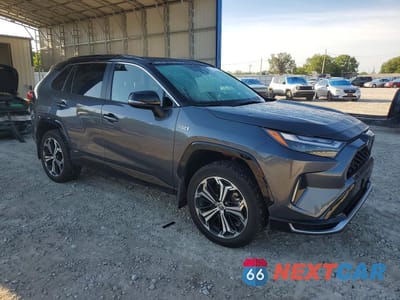 Czwarte zdjęcie samochodu z boku: 2024 TOYOTA RAV4 PRIME XSE VIN:JTMFB3FV8RD173375 - miniatura