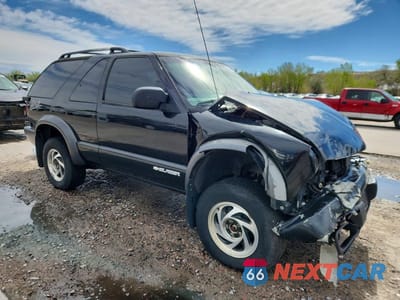 Czwarte zdjęcie samochodu z boku: 2005 CHEVROLET BLAZER VIN:1GNCT18X95K101049 - miniatura
