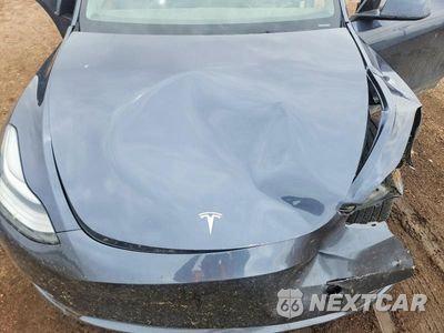Zdjęcie 11 z 12 samochodu: 2023 TESLA MODEL Y VIN:7SAYGDEE4PF601680 - miniatura