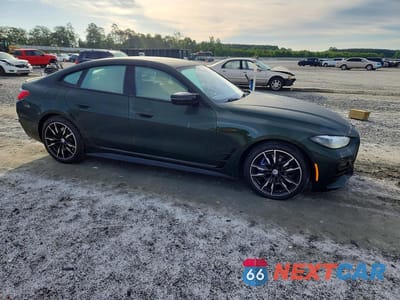 Czwarte zdjęcie samochodu z boku: 2022 BMW M440XI GRAN COUPE VIN:WBA13AW09NFN20689 - miniatura