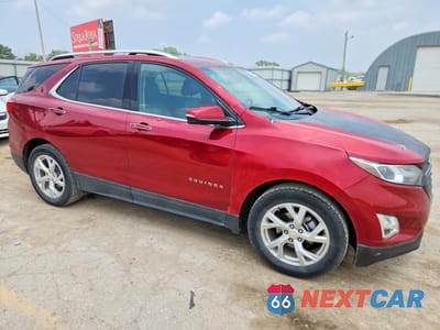 Czwarte zdjęcie samochodu z boku: 2021 CHEVROLET EQUINOX PREMIER VIN:2GNAXNEV8M6108162 - miniatura