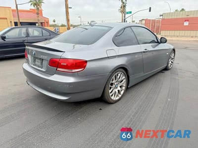 Czwarte zdjęcie samochodu z boku: 2010 BMW 328 I SULEV VIN:WBAWV1C59AP124380 - miniatura