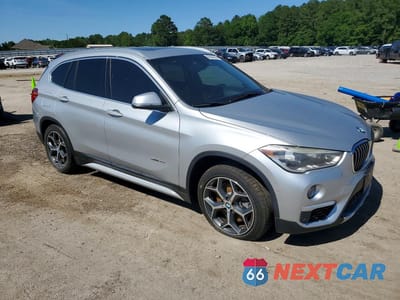 Czwarte zdjęcie samochodu z boku: 2017 BMW X1 SDRIVE28I VIN:WBXHU7C31H5H36309 - miniatura