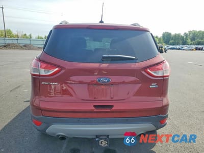 Zdjęcie 6 z 12 samochodu: 2016 FORD ESCAPE SE VIN:1FMCU9G99GUC00447 - miniatura